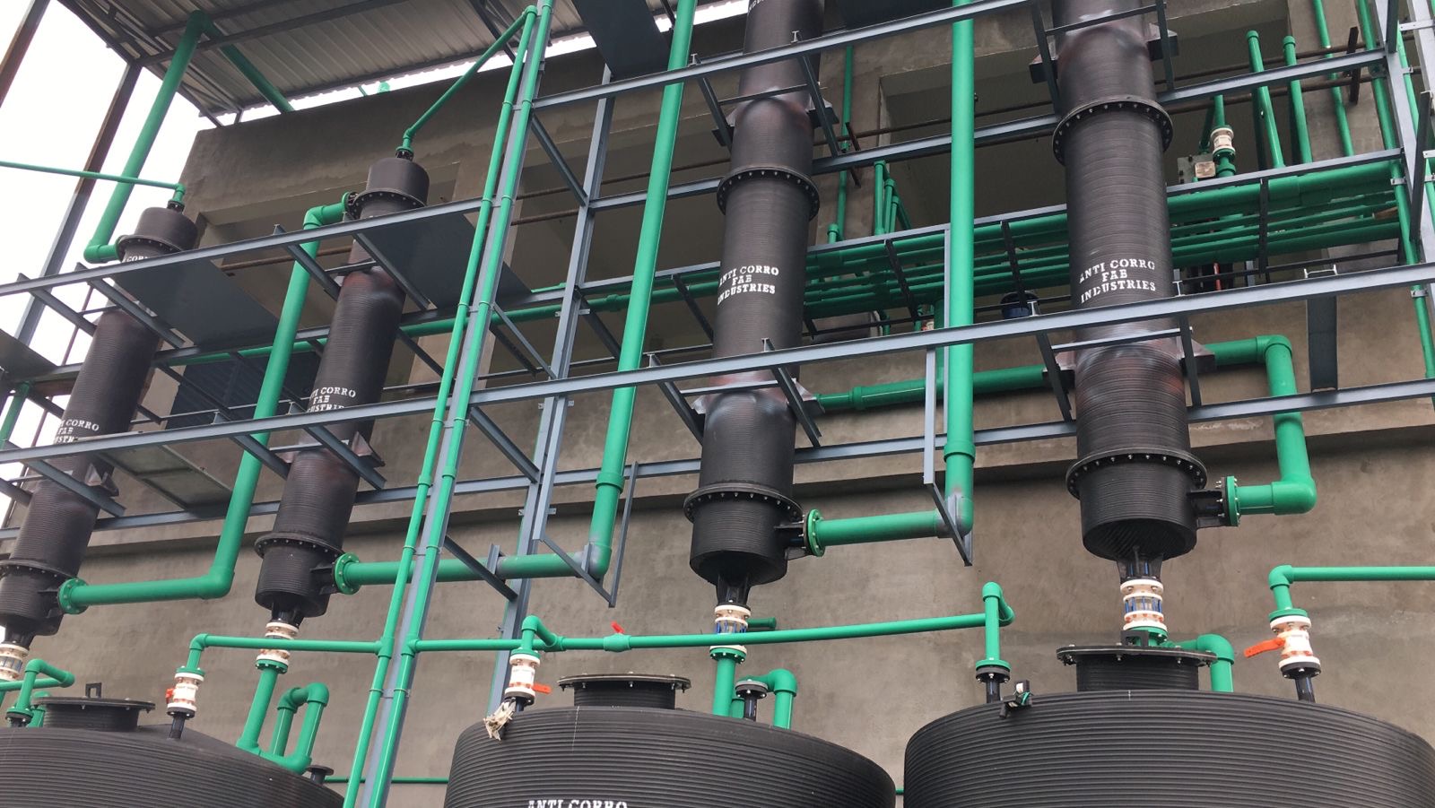 ACFI facility overhead piping and installation view